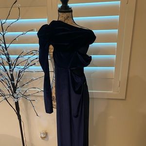 Brand new long blue dress , cut out sides